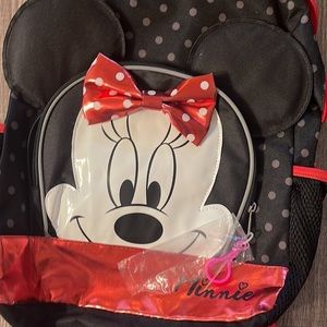 Like New (never used) Minnie full size backpack. Measures approx 19 inches long.